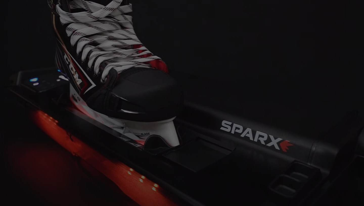 Hockey Skate Loaded into the ES200 Sparx Sharpener